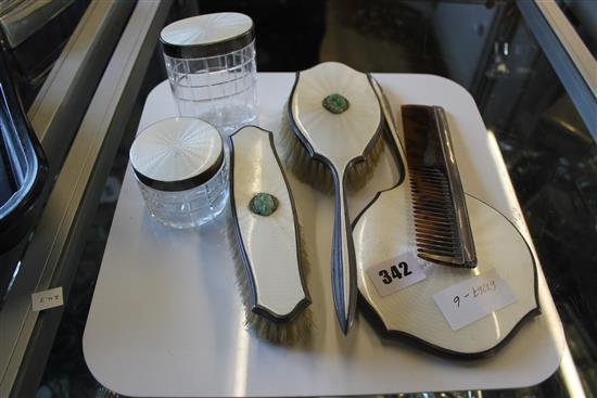 An Art Deco silver, enamel and paste dressing table set